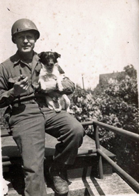 Cross holding mascott Tuffy