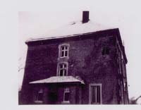 Exterior of building in which T/5 Ross was wounded