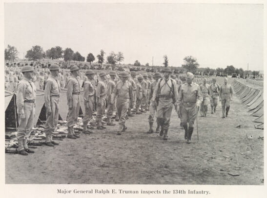 Major General Ralph E. Truman inspects the 134th Infantry Regiment