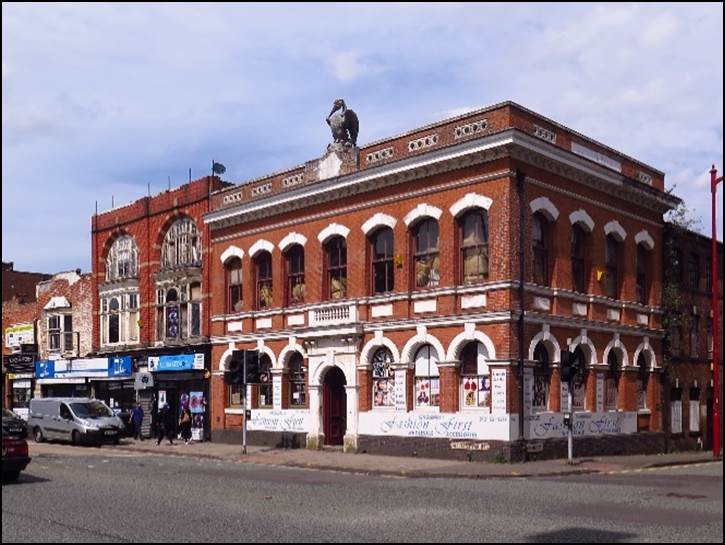 A picture containing building, sky, outdoor, road

Description automatically generated