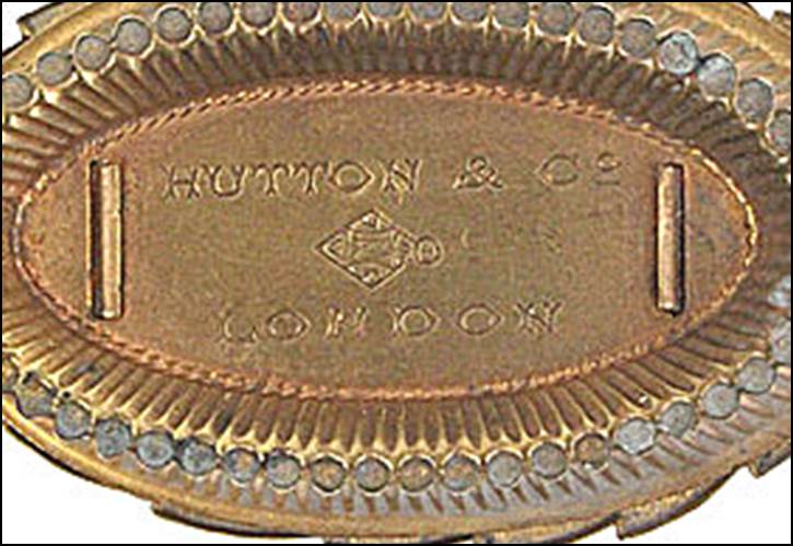 A picture containing object, coin

Description automatically generated