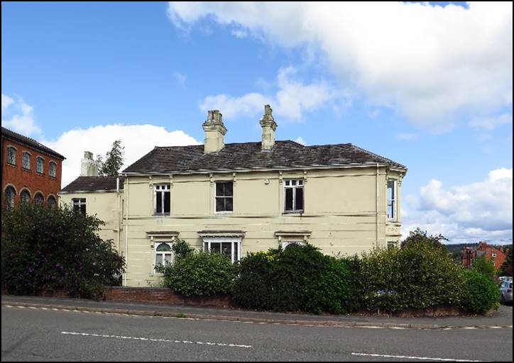 A picture containing sky, road, outdoor, house

Description automatically generated