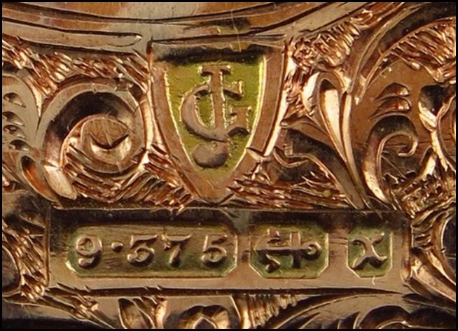 A picture containing gold, table, box, old

Description automatically generated