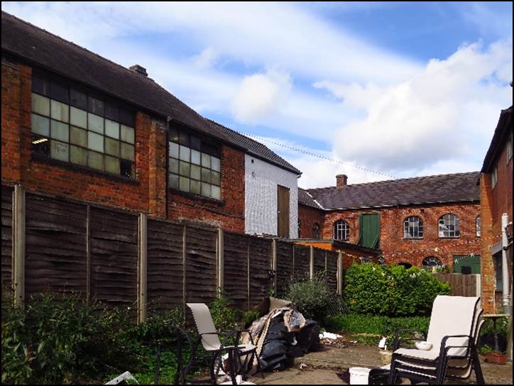 A picture containing sky, outdoor, building, house

Description automatically generated