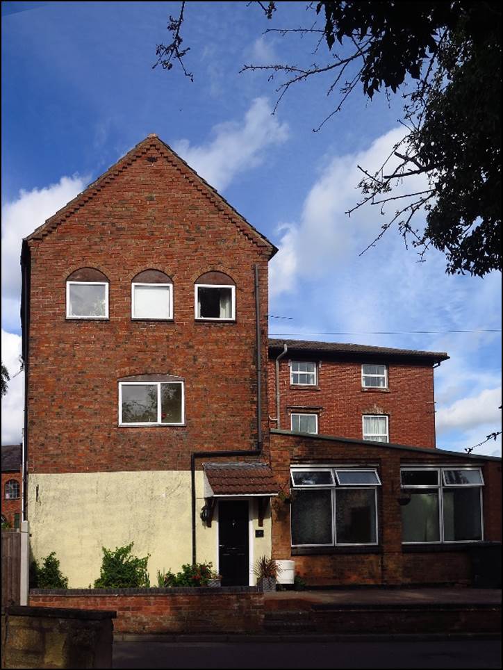 A picture containing sky, building, outdoor, tree

Description automatically generated