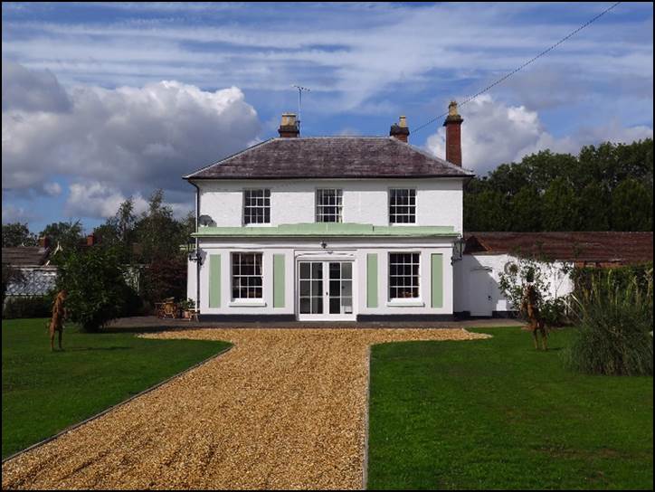A picture containing grass, sky, outdoor, house

Description automatically generated