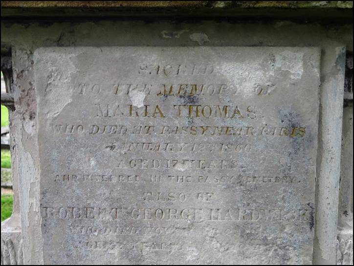 A tombstone with writing on it

Description automatically generated with low confidence