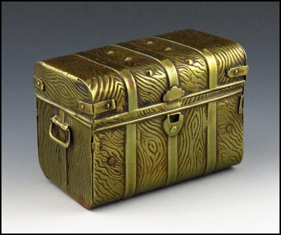 A close-up of a treasure chest

Description automatically generated