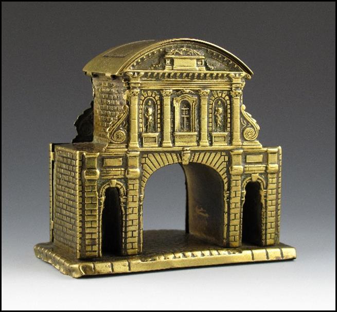 A gold metal object with a arched entrance

Description automatically generated with medium confidence