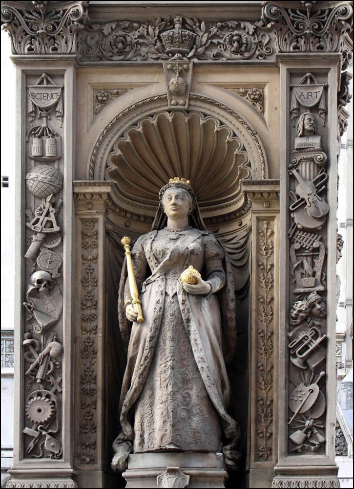 A statue of a person holding a scepter

Description automatically generated