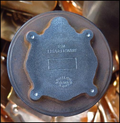 A close up of a metal pan

Description automatically generated
