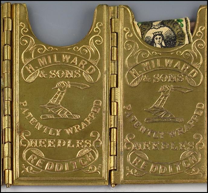 A gold card holder with a few cards

Description automatically generated with medium confidence