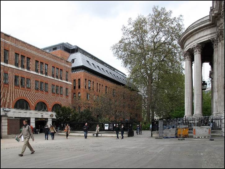 A picture containing building, outdoor, sky, road

Description automatically generated