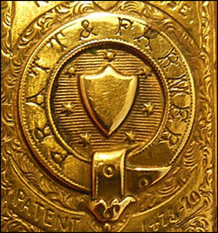 A close-up of a gold object

Description automatically generated