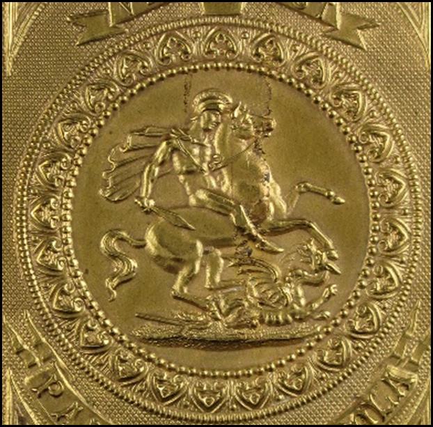 A gold cigarette case with a horse on it

Description automatically generated