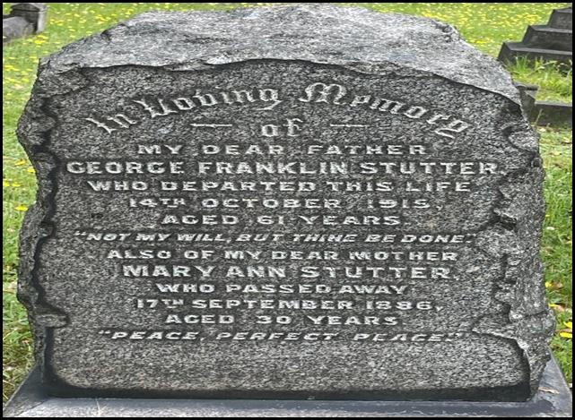 A tombstone in a cemetery