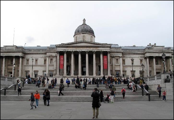 A large white building with columns and a dome on top

Description automatically generated with medium confidence