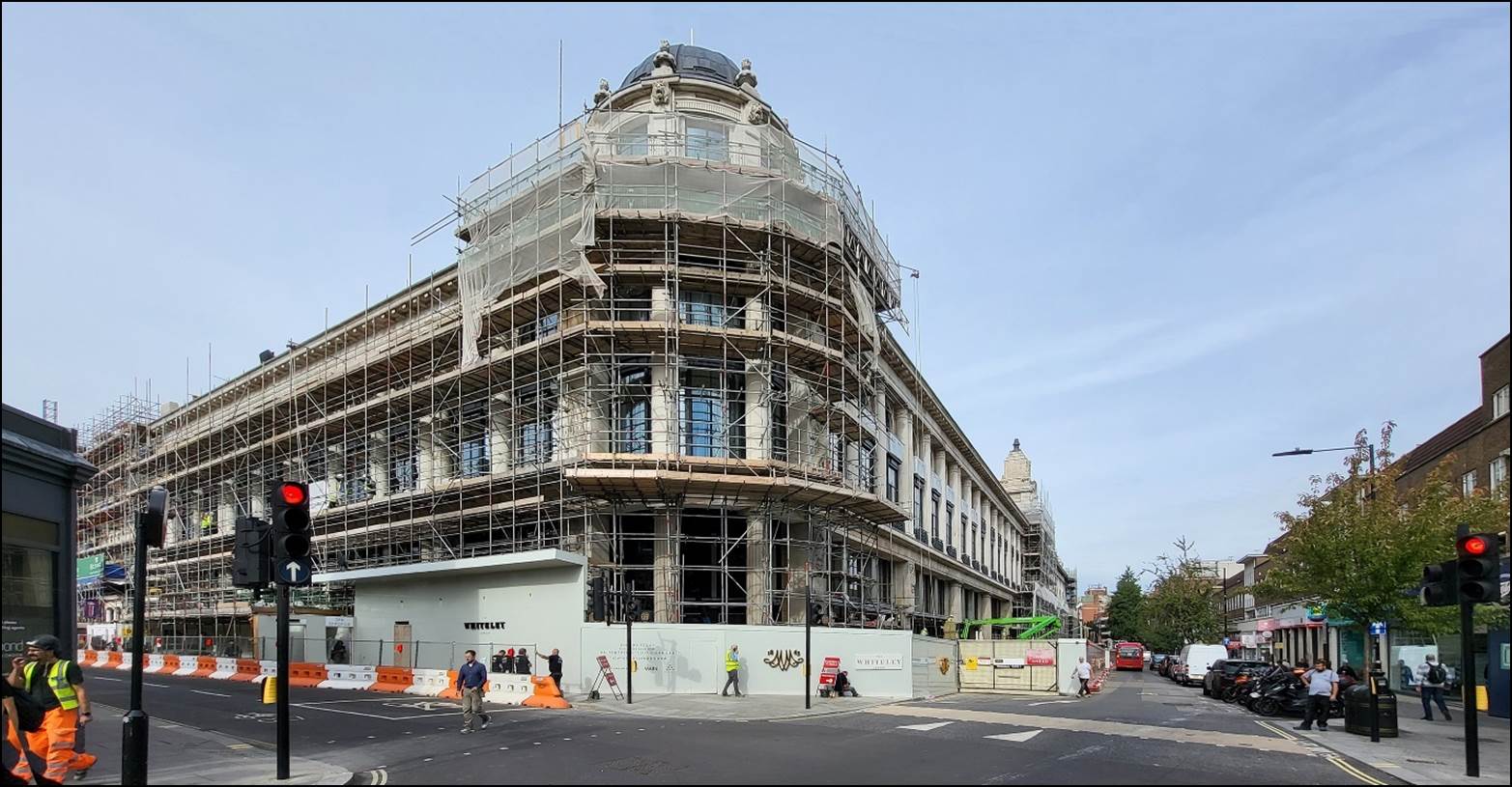 A building under construction with scaffolding

Description automatically generated