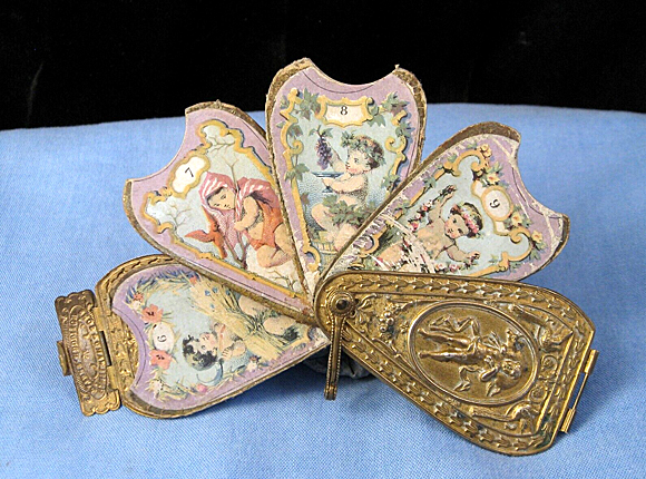 Fan with Cupid front
view needle case